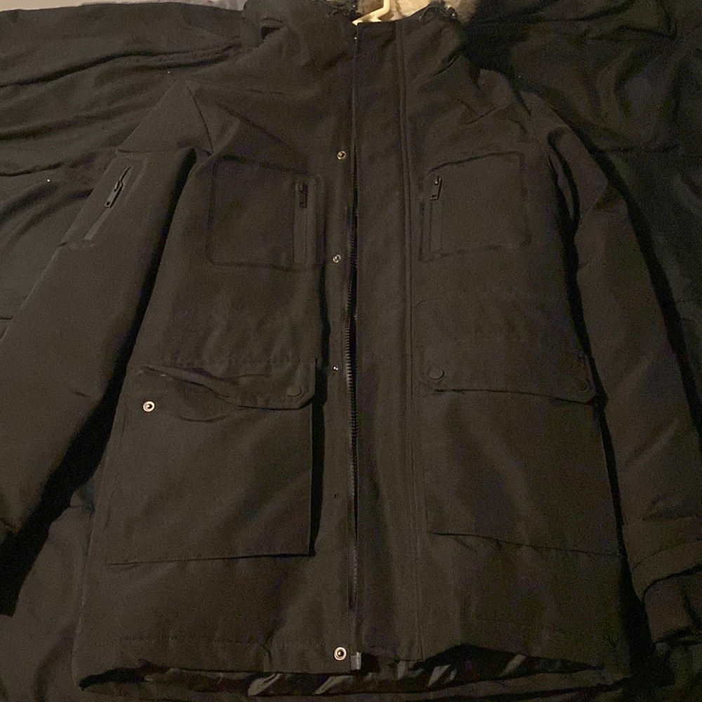 Black jacket with fur hood